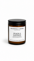 peach and saffron hand poured soy wax candle black lid